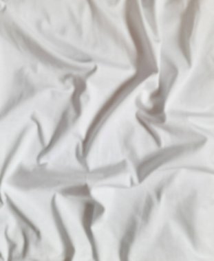 Beyaz kumaş dalgalanma dokusu. Kumaş katlanır