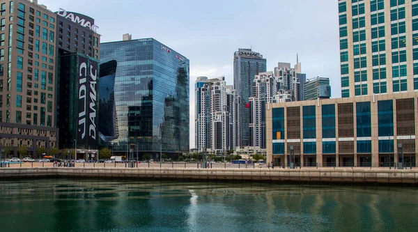 Modern buildings along the Dubai water canal, business bay district UAE. Outdoors
