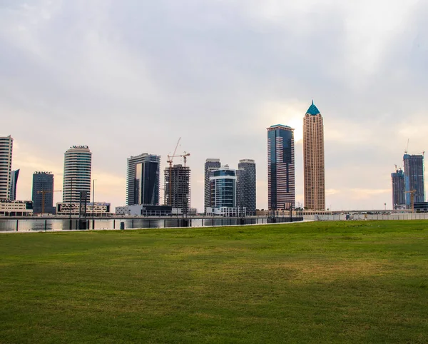 Modern buildings along the Dubai water canal, business bay district UAE. Outdoors