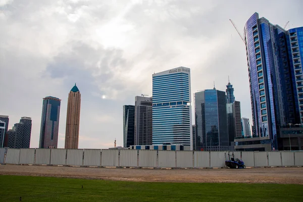 Modern buildings along the Dubai water canal, business bay district UAE. Outdoors