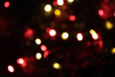 Bulanık ışıklarla renkli bir arkaplan görüntüsü.