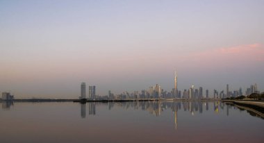 Dubai, UAE - 01.29.202 Sunrise over Dubai city skyline.
