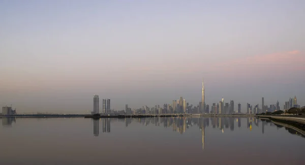 Dubai, UAE - 01.29.202 Sunrise over Dubai city skyline.