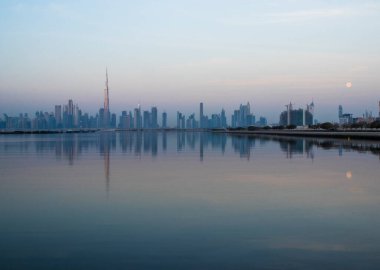 Dubai, UAE - 01.29.202 Sunrise over Dubai city skyline.