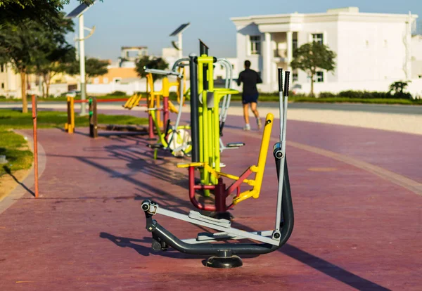 Outdoor gym in the park on early morning hour.