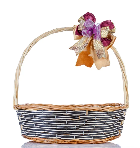 Empty wicker basket with ribbon isolated on white background — Stock Photo, Image