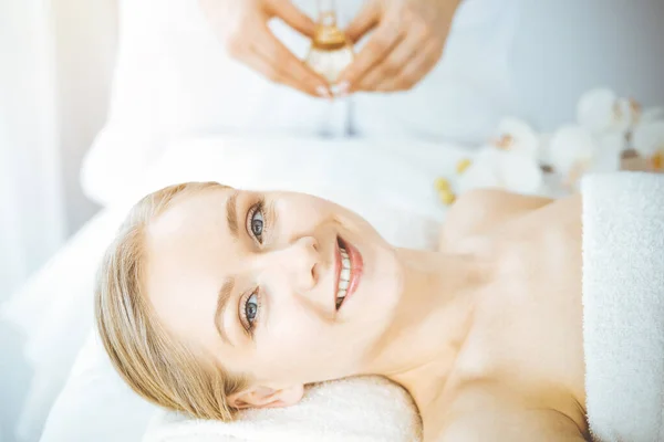 Happy woman smiles before spa procedures getting. Beauty and joy concept — Stock Photo, Image