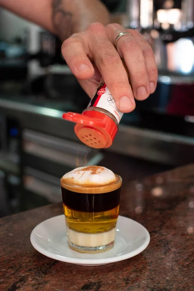 coffee with alcohol, cinnamon and lemon