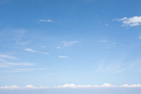 Blue sky background with clouds — Stock Photo, Image