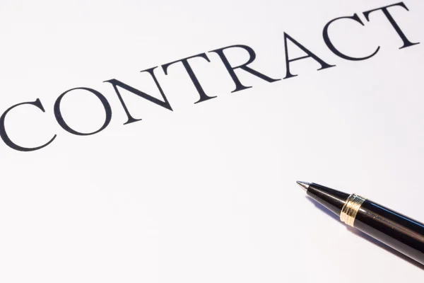 Contract en pen — Stockfoto