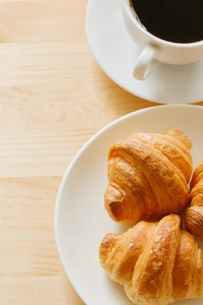 Croissant and coffee — Stock Photo, Image