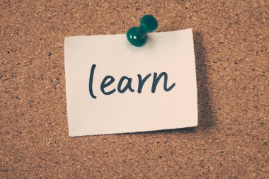 learn note pinned on the bulletin board