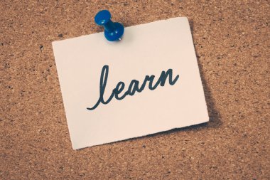 learn note pinned on the bulletin board