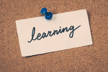 learning note pinned on the bulletin board
