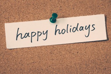 mutlu tatiller Not ilan panosuna iğnelenmiş