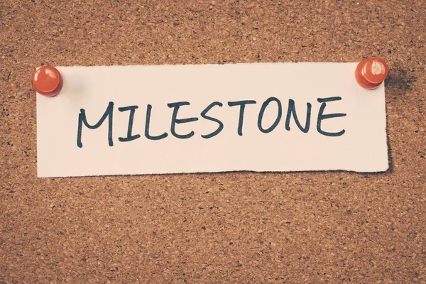 Milestone note pinned on the bulletin board — Stock Photo, Image