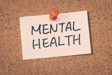 mental health note pinned on the bulletin board