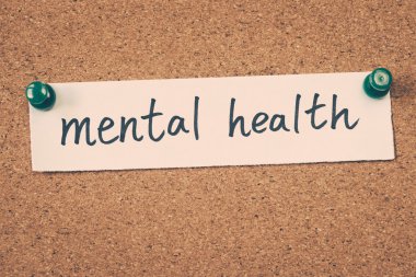 mental health note pinned on the bulletin board