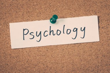 psychology note pinned on the bulletin board