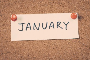 January note pinned on the bulletin board