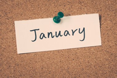 January note pinned on the bulletin board