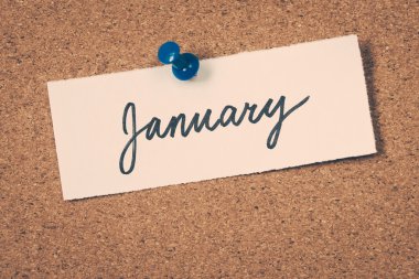 January note pinned on the bulletin board