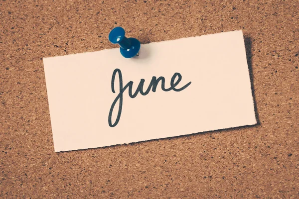 June note pinned on the bulletin board — Stock Photo, Image