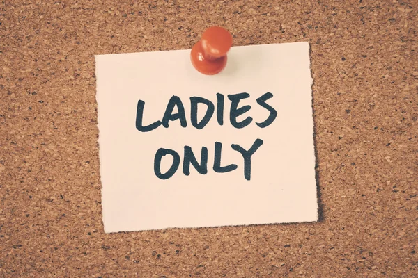 Ladies only note pinned on the bulletin board — Stock Photo, Image