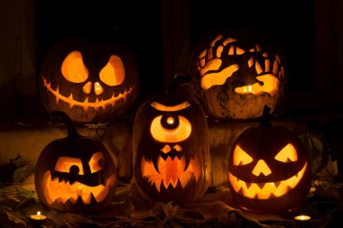 Photo composition from five pumpkins on Halloween. clipart