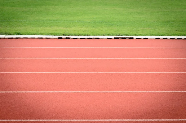 Running track with soccer field vignetted — Stock Photo, Image