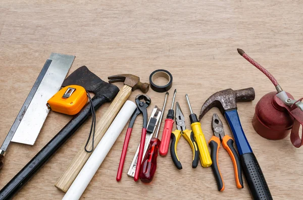 Set of different tools for work on wood background — Stock Photo, Image