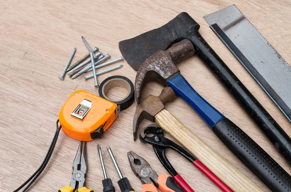 Set of different tools for work on wood background — Stock Photo, Image