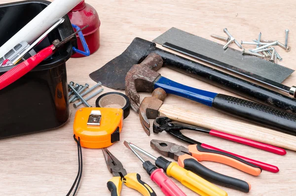 Set of different tools for work on wood background — Stock Photo, Image