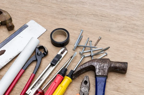 Set of different tools for work on wood background Stock Picture