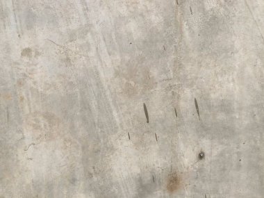 Kirli arka planda gri çimento ve beton.