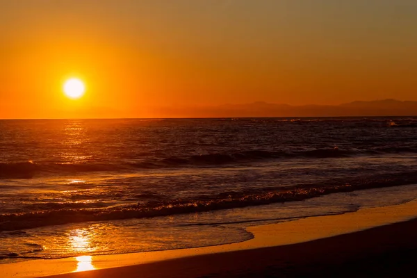 Sunset on the tropical sea. Summer evening.