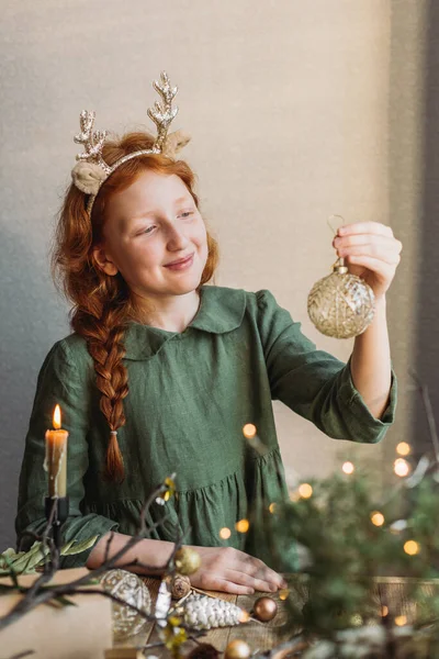 Red Haired Girl Green Linen Dress Looks Christmas Decorations — Stock Photo, Image