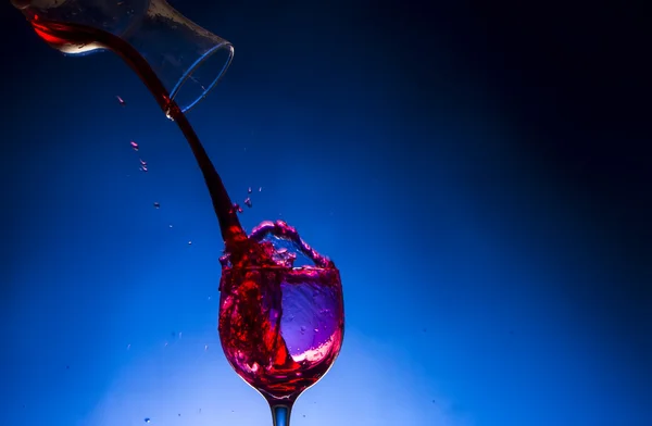 Splash glass red wine Stock Image