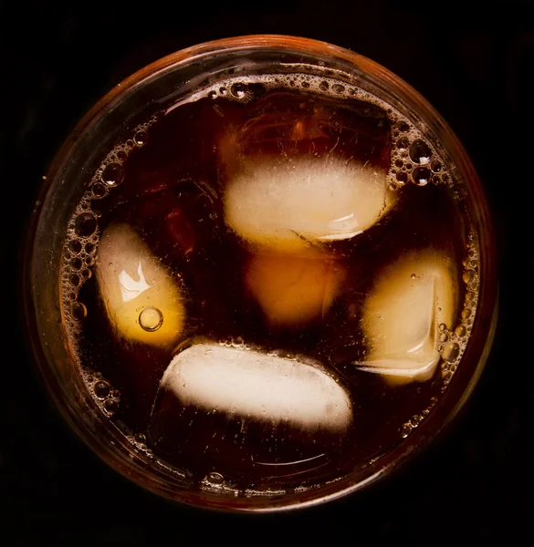 Glass with dark liquid — Stock Photo, Image