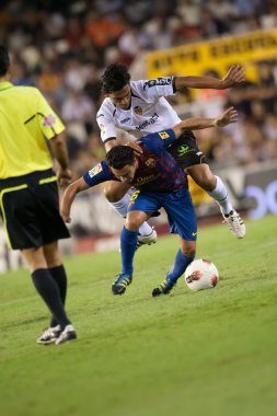 Xavi Hernandez ve Tino Costa içinde hareket