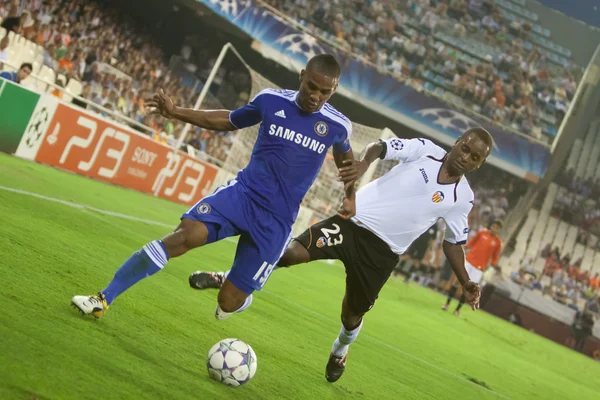 Malouda en Miguel in actie — Stockfoto