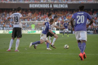 Valencia oyuncu barragan ve rcd espanyol oyuncu dağlardır eylem