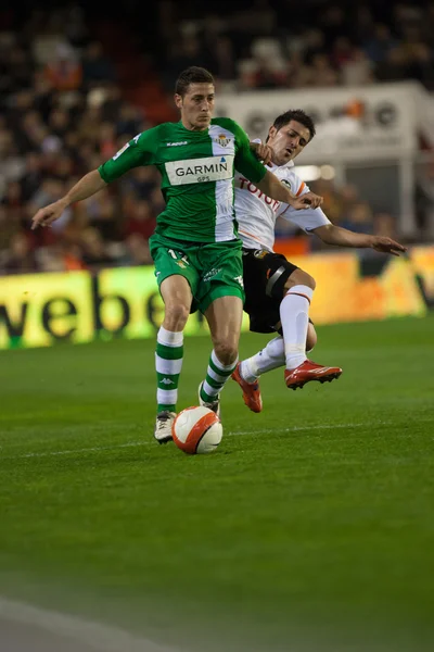 Damia (L) and David Villa (r) in action — Stock Photo, Image