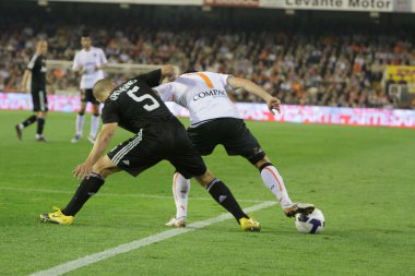 David Villa	 (R) and Fabio Cannavaro (L) fighting for a ball
