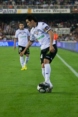 Vicente with a ball and Jordi Alba during the game
