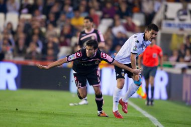 Antonio Tomas (L) ve David Villa (R) eylem