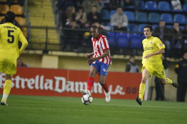 Luis Perea (C), Joan Capdevila (L) ve Joseba Llorente eylem