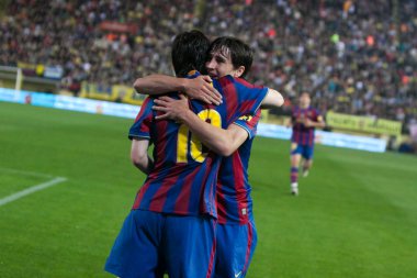 Lionel Andres Messi and Bojan Krkic celebrate a goal clipart