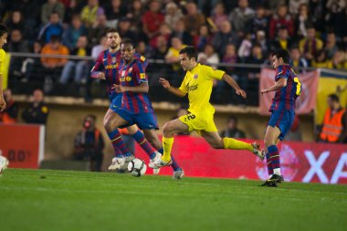 Giuseppe Rossi (C), Pedro Rodriguez (R) ve Seydou Keita (L) eylem