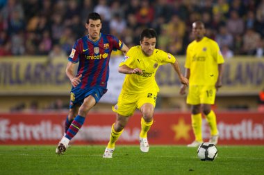 Giuseppe Rossi (R) ve Sergio Busquets (L) eylem